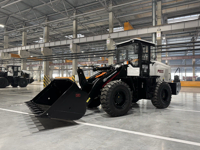 Фронтальный погрузчик PB30. Вид спереди на производстве