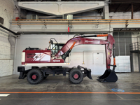 Полноповоротный колёсный экскаватор Профессионал PB155W