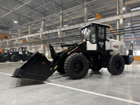 Фронтальный погрузчик Профессионал PB30. Вид слева.